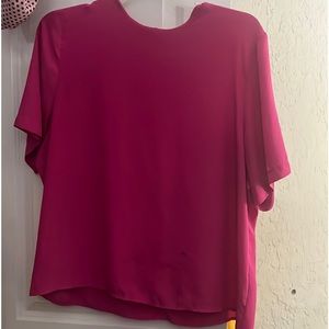 The blouse is not a name brand blouse nor is it new. It is as is